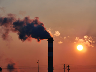 Fototapeta premium chimney and sunrise