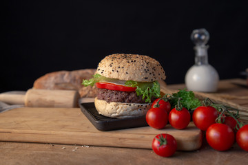 Hamburger homemade on wood table.