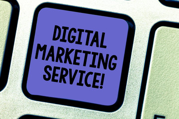 Fototapeta premium Text sign showing Digital Marketing Service. Conceptual photo services using digital channels to reach consumers Keyboard key Intention to create computer message pressing keypad idea