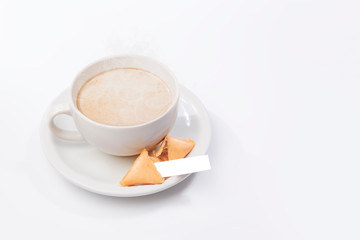 Fortune cookies with blank paper and cup of coffee