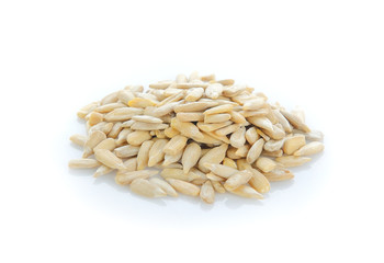 Healthy sun-flower seeds on a white background