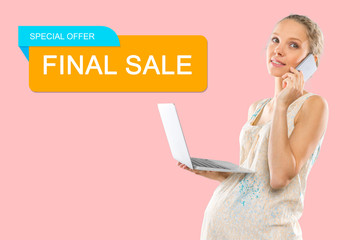 Portrait of the young happy smiling pregnant woman