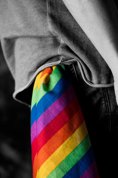 man with a rainbow-patterned handkerchief