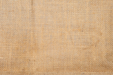 Closeup hessian fabric texture background, blank brow fiber pattern background, natural color fiber