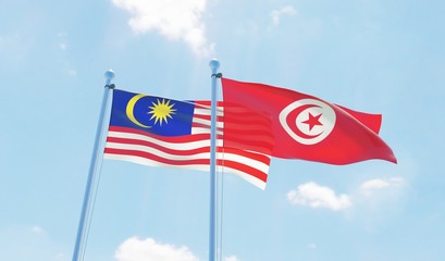 Tunisia and Malaysia, two flags waving against blue sky. 3d image