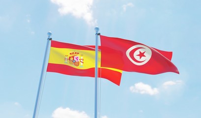 Tunisia and Spain, two flags waving against blue sky. 3d image