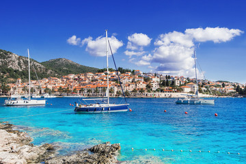 Sailing boats in a beautiful bay of the Hvar island, Dalmatia, Croatia