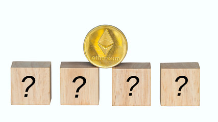 Ethereum  coin  and box wood have space for input text are placed together on a  floor, Concept Hard fork and new coin distribution For coin holders ETH