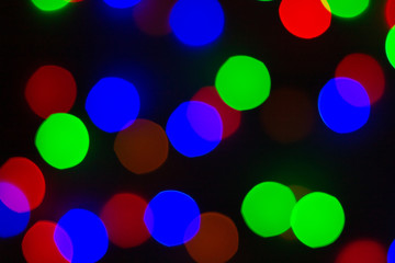 Bright colorful festive background. Blurred lights