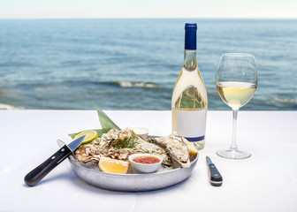Oysters and wine overlooking the sea