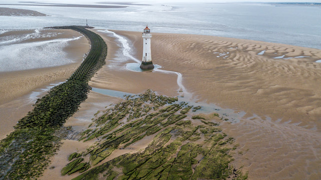 The beach at Wallasey and New Brighton Lighthouse