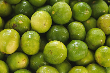 Lime pile together with water on them looking from top