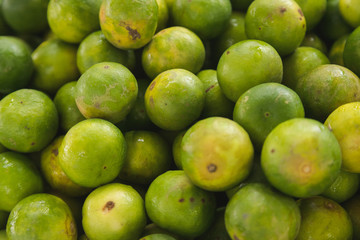 Lime pile together with water on them