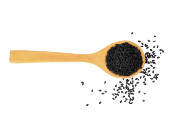 Black Sesame Seeds in wooden spoon isolated on white background