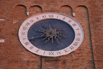 Chioggia, Veneto, Italy. Clock of the bell tower of S.Andrea, It is the oldest functioning medieval clock in the world.