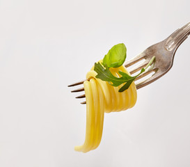 Italian spaghetti would around a silver fork