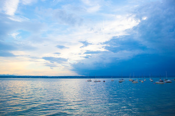 Obraz na płótnie Canvas Bodensee lake sunset with view on the Alps mountains