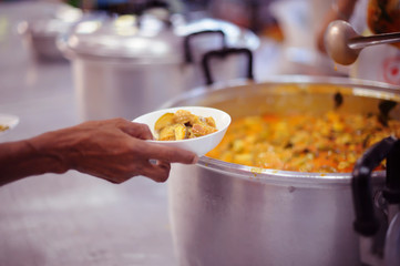 Providing food to the poor is helping sharing from fellow humans together : Concept of famine and social inequality