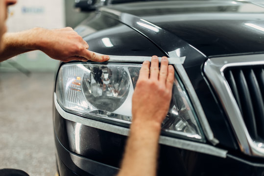 Auto detailing of car headlights, carwash service