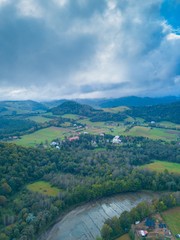 Fototapeta na wymiar Beautiful Bieszczady mountains and village view photographed from drone