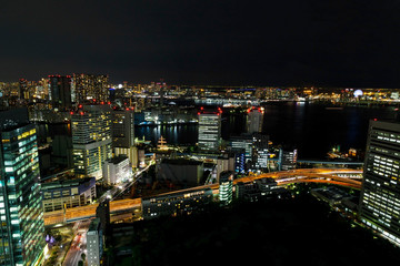 Tokyo city skyline with night light  and railway , japan