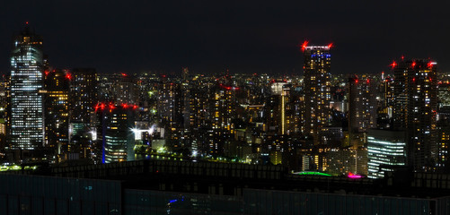 Tokyo city skyline with night light  and railway , japan