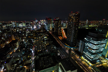 Fototapeta premium Tokyo skytree tower in Japan in night light with brigde and building