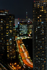 Fototapeta na wymiar Tokyo skytree tower in Japan in night light with brigde and building