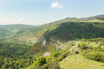 Obraz premium Spectacular high valley of the river Saja, covered by the leafy beech woods that make up Mount Saja. Cantabria