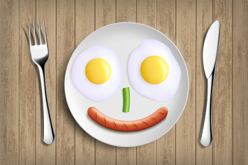 Plate with fried eggs, vegetable and sausage like a smiling face.