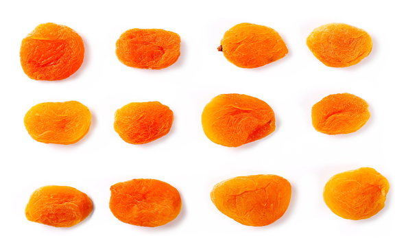 Set dry apricots isolated on white background, top view