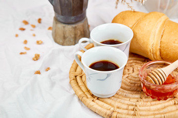 Good morning. Two cup of coffee with croissant and jam.