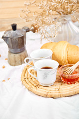 Good morning. Two cup of coffee with croissant and jam.