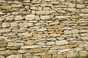 Old relief limestone wall closeup