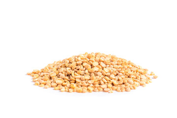 Split peas in brown bowl isolated on white background.