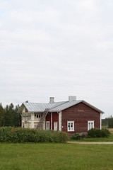 Fototapeta na wymiar A Finnish wooden house in construction nearly at completion