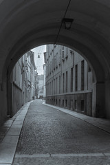 Parma, Italy . Street view through the arch in the Old town.(tone effect)