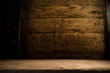 background of barrel and worn old table of wood