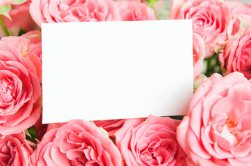 Card for congratulations, inscriptions in a bouquet of pink roses. Mock up, a place for text, copy space.