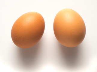 two eggs on table, view from above
