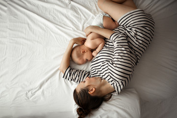 Breastfeeding baby for 6 months, mother gently