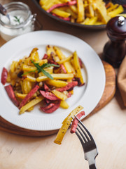 Fried potato with sausage national russian cuisine