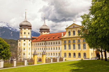 Fototapeta na wymiar Exterior of the stams Abbey (Stift Stams) established by Cistercian monks in 1273 in Tyrol, Austria and later revamped in Baroque style.