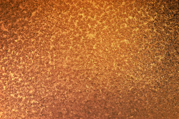 Bronze non-uniform background. Patterned metal texture industrial subjects