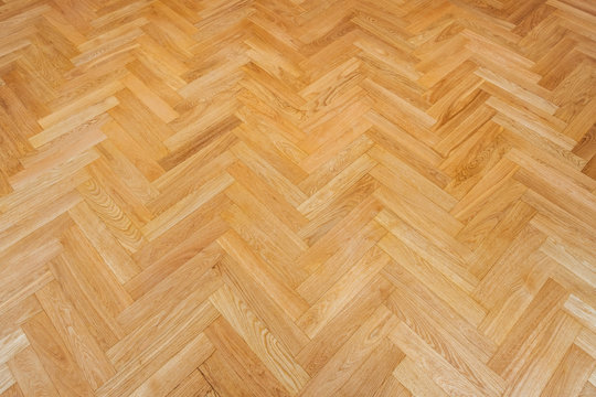 parquet floor background - heringbone parquet flooring