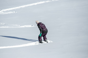 Fototapeta na wymiar snowboarding girl
