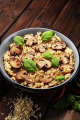 risotto with mushrooms, fresh herbs and parmesan cheese