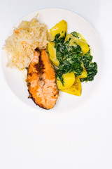 Grilled salmon with potato and spinach