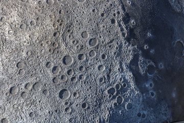 A picture of craters on the surface of the moon. © abrilla