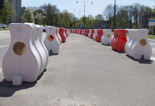 Organization Of Road Traffic Using Road Separators. Other Names Are Reflective Traffic Separator, Traffic Separator Barrier, Road Block Traffic Barrier.